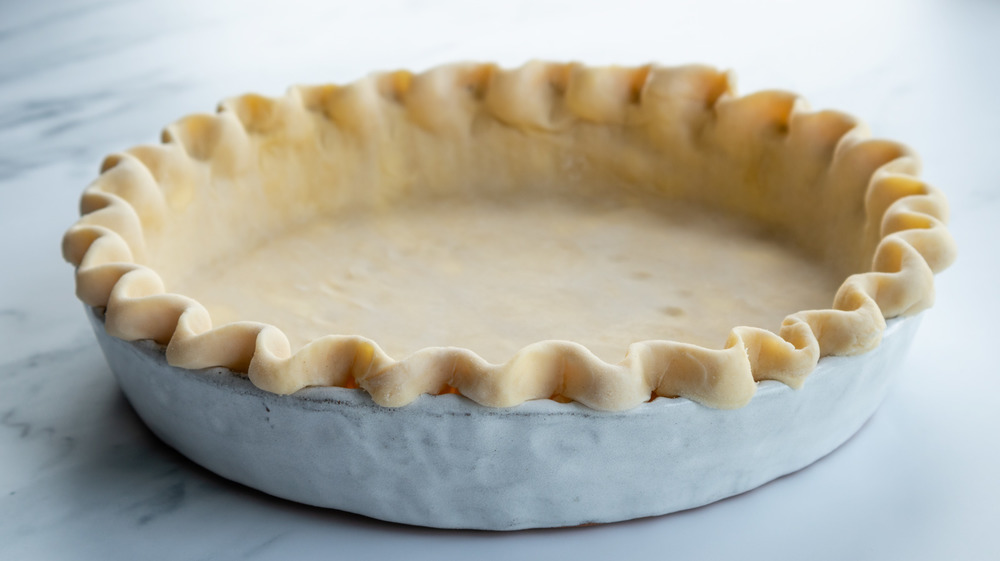 Prepare the pie crust correctly for bacon onion quiche