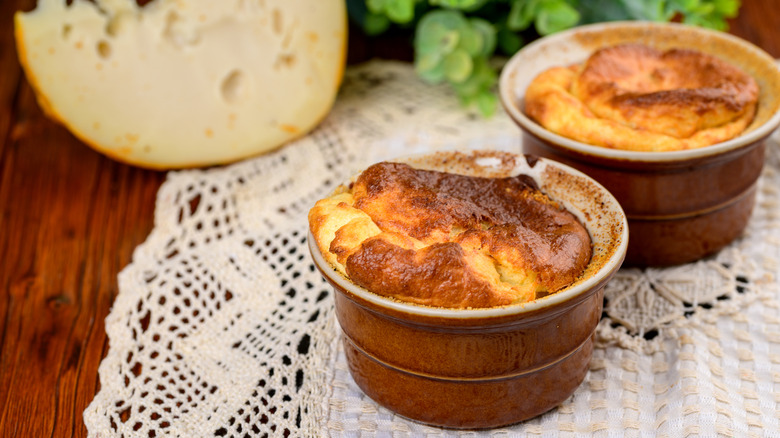 cheese soufflé in ramekins on doily